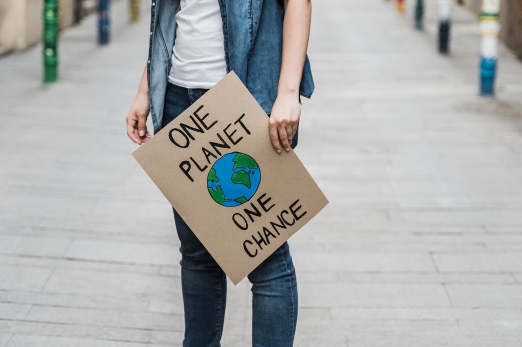 Demonstration on the city protesting against climate change - Global warming and environment concept